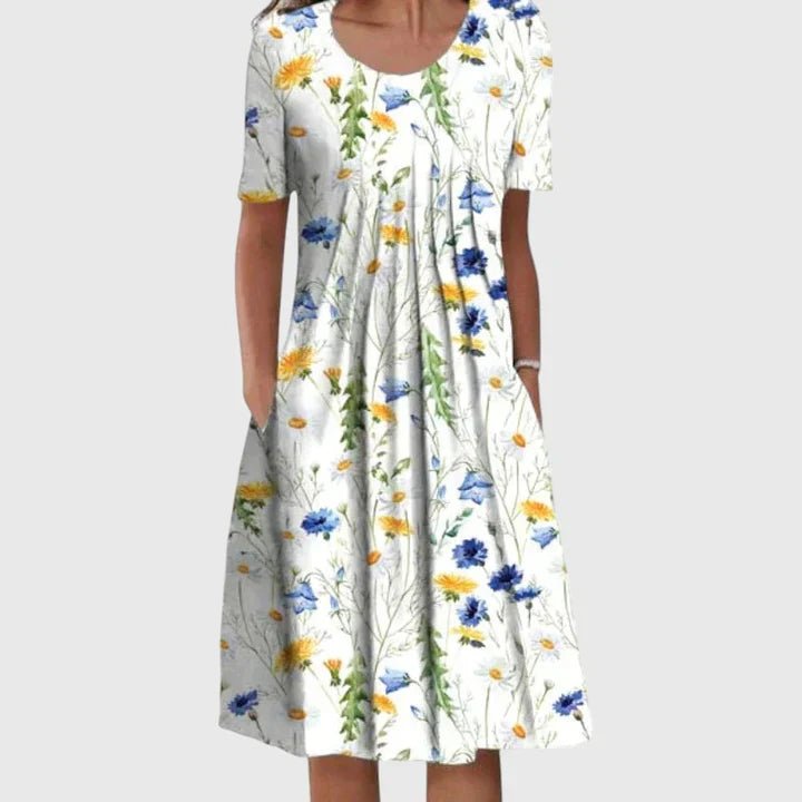 Iris - Elegante losvallende jurk met bloemenprint voor dames Side